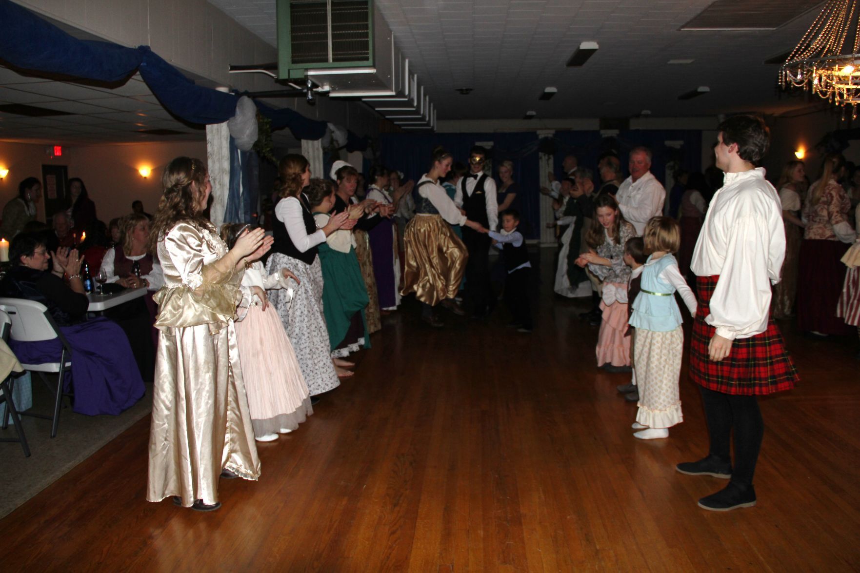 People dance to the Virginia Reel at the Twelfth Night Ball in 2014